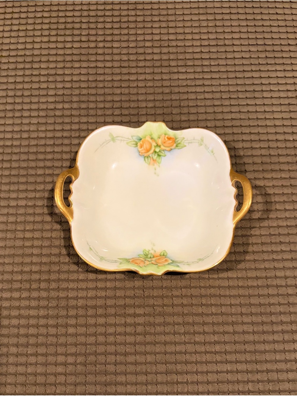 Antique hand painted porcelain trinket dish.